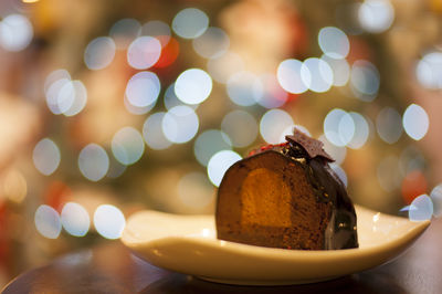 Close-up of christmas lights on table