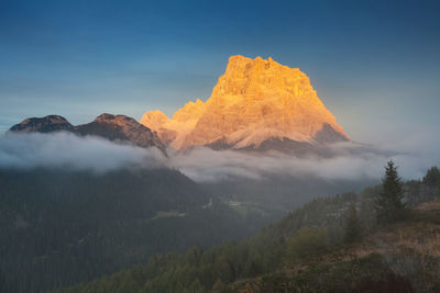 Scenic view of majestic mountains against sky
