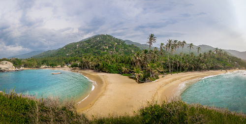 Scenic view of beach against sky