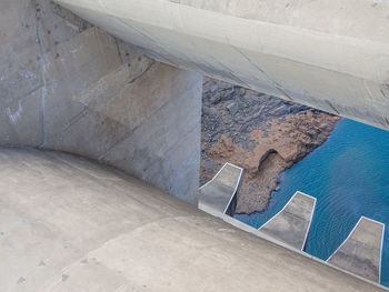 View of river and concrete katse dam wall, lesotho, africa