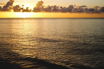 Scenic view of sea at sunset