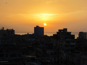 View of cityscape at sunset