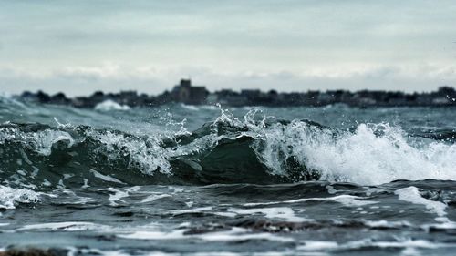Waves splashing on rocks