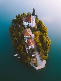 High angle view of trees and building against sky