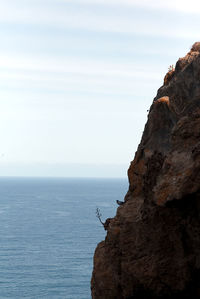 Scenic view of sea and rock formation