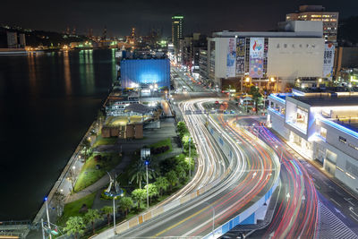 High angle view of light trails on road at night