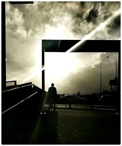 Road against cloudy sky at sunset