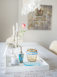 Close-up of vase on table at home