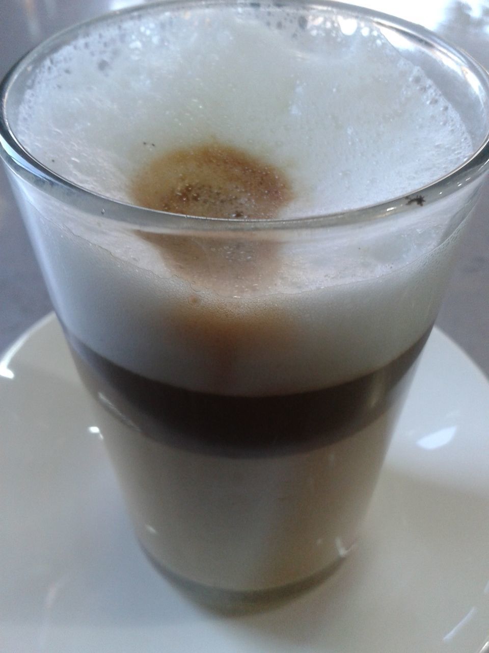 CLOSE-UP OF TEA CUP ON TABLE