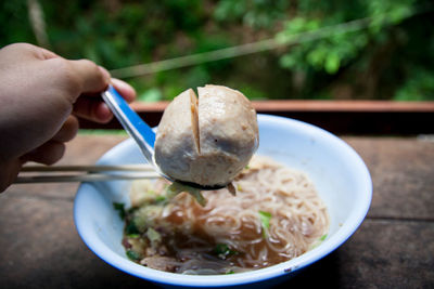 Close-up of hand holding food