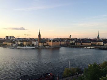 View of cityscape against sky during sunset