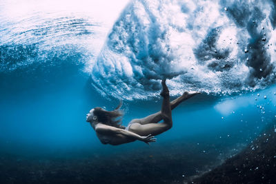 Man swimming in sea