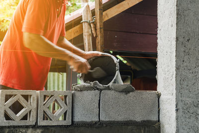 Motion blur bricklayer man working build for construction at home