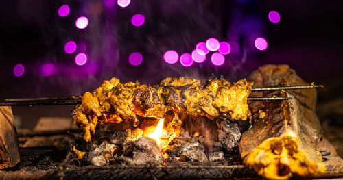 Close-up of bonfire on barbecue grill