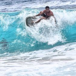 Man surfing in sea