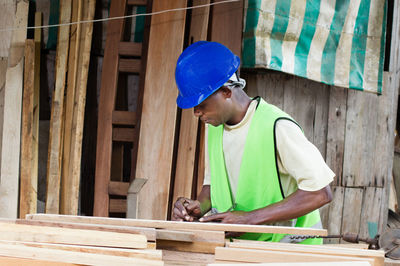 The carpenter planed wood before making furniture.