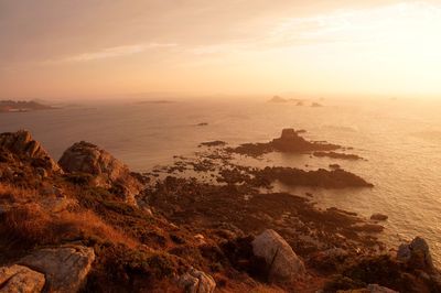 Scenic view of sea against sky during sunset