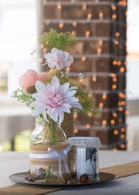 Close-up of flower vase on table