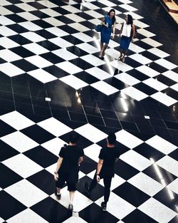 Woman standing on footpath
