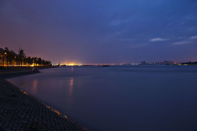 View of calm sea at dusk