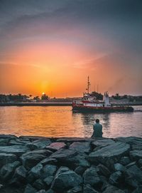 Scenic view of sea at sunset