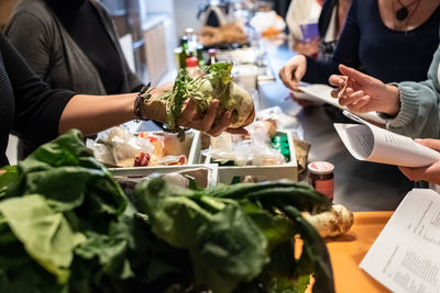 Midsection of woman having food