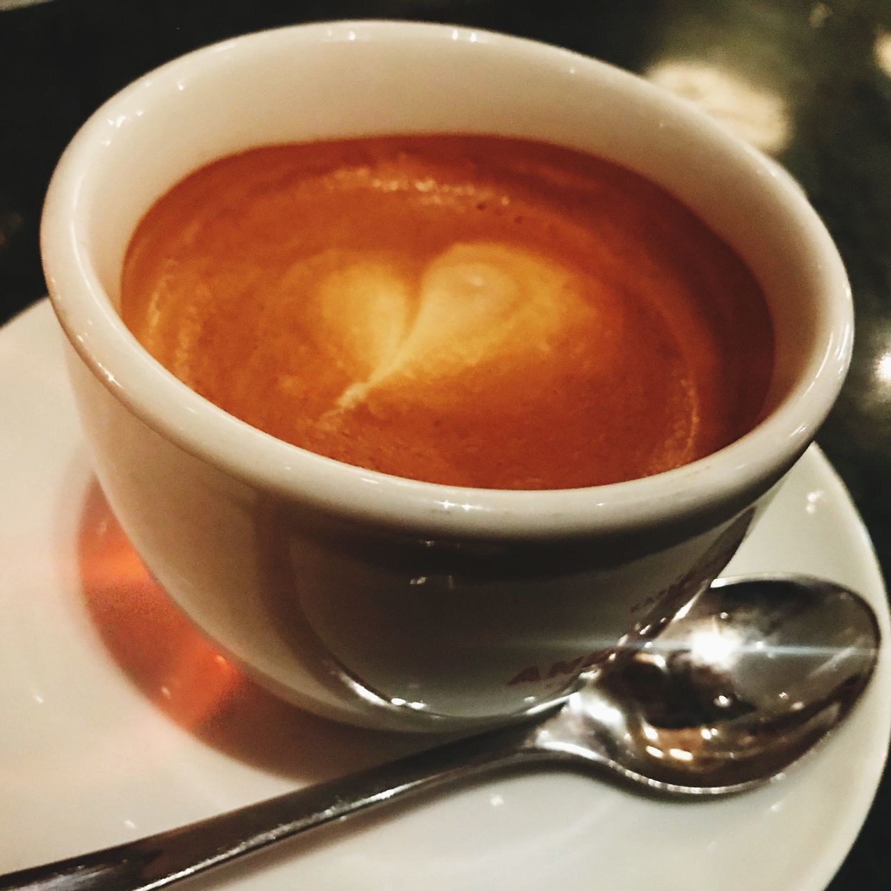 CLOSE-UP OF CUP OF COFFEE