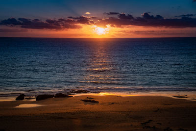 Natural marine landscape with amazing sunset over the ocean in fuerteventura canary island spain. 