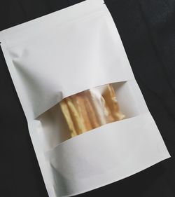 High angle view of cake on white background