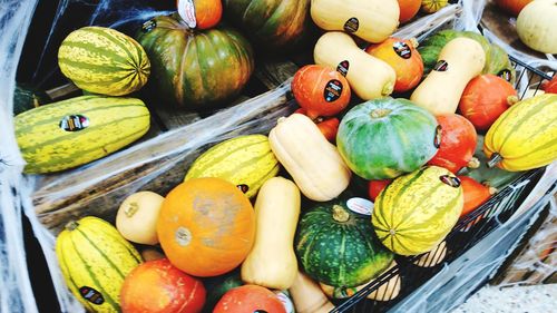 High angle view of pumpkins for sale at market stall