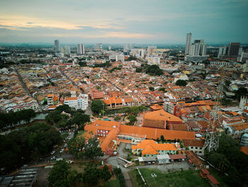 High angle view of townscape against sky during sunset