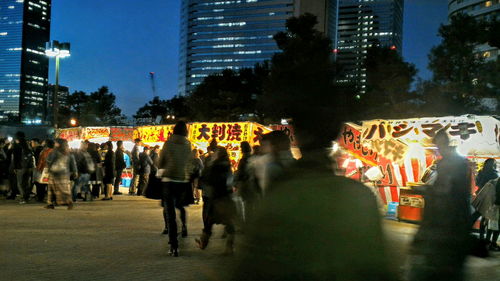 People in city at night