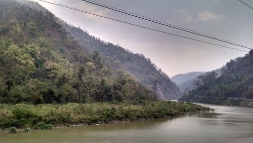 Scenic view of river and mountains