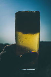 Close-up of beer glass on table