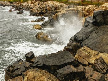 Scenic view of rocks in sea