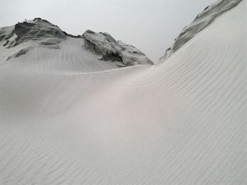 Scenic view of snow covered mountains