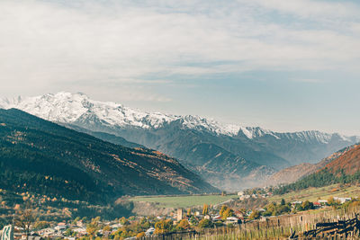 Scenic view of snowcapped mountains against sky