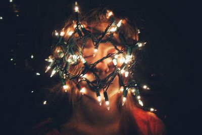 Close-up of illuminated christmas tree at night