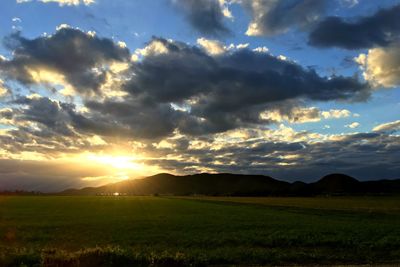 Scenic view of landscape against sky during sunset