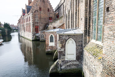 View of canal along buildings