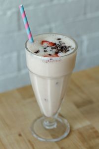 High angle view of drink in glass on table