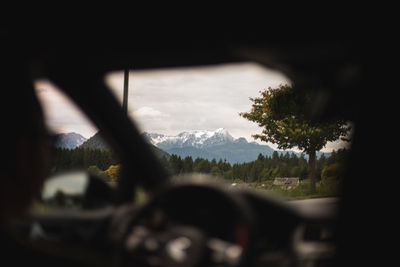 Mountain seen through vehicle windshield