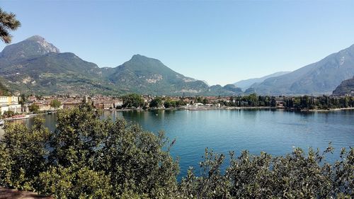 Scenic view of lake with mountain range in background