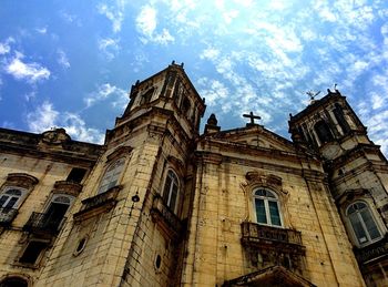 Low angle view of historic church against sky