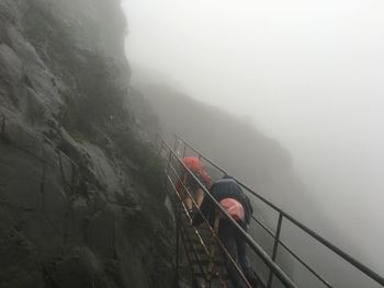 High angle view of bridge in foggy weather
