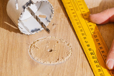 High angle view of tape measure on table