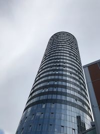 Low angle view of modern building against sky