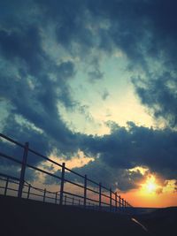 Scenic view of landscape against cloudy sky
