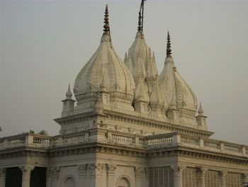 Low angle view of temple building against clear sky