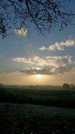 Scenic view of landscape against sky during sunset